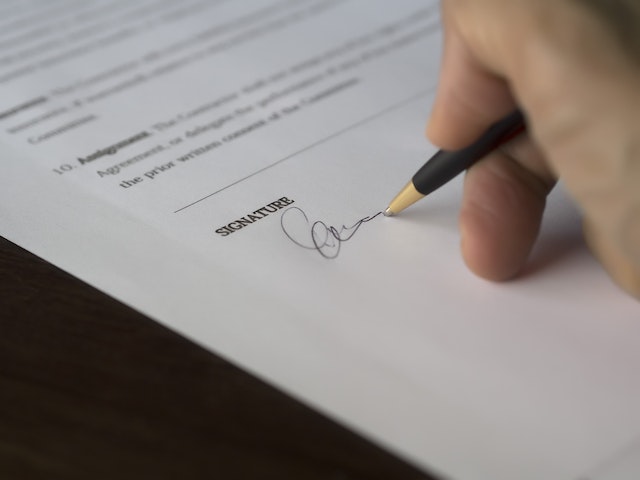 person signing legal document