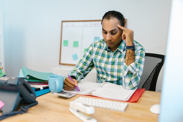 stressed man at desk