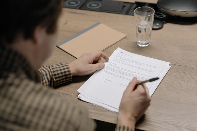 man looking at document