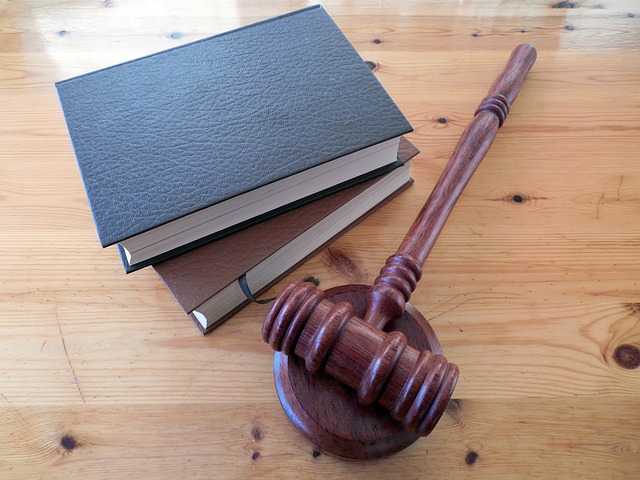 gavel next to books on desk
