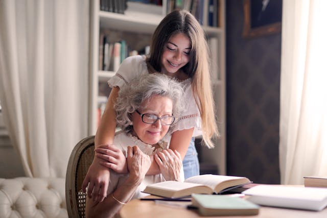 older woman smiling with younger child